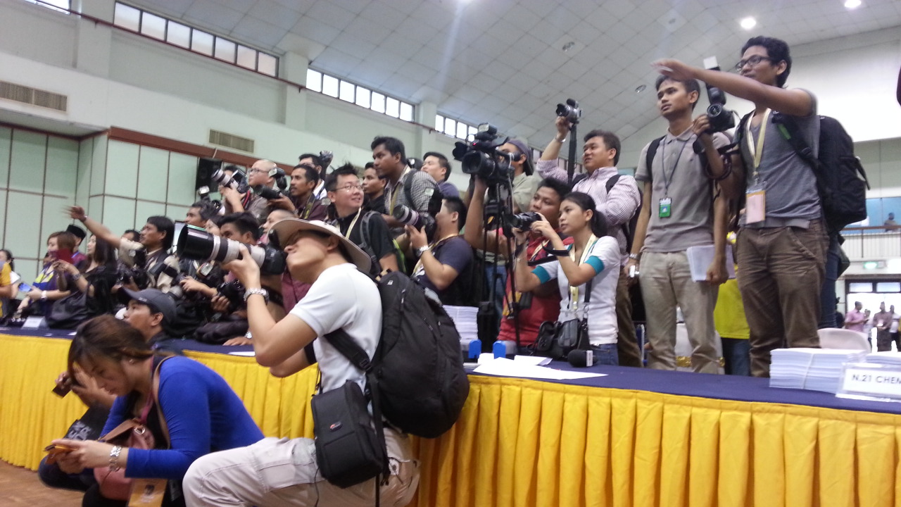 Cameramen take photos of the Pandan candidates