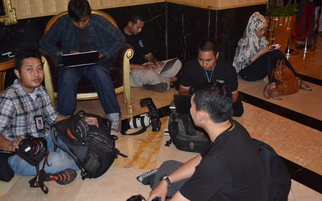 Some of the local paparazzi outside PC room