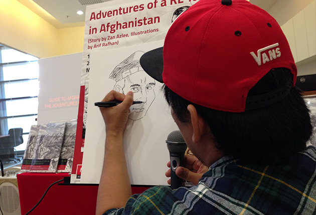 Arif demonstrated his hand drawn illustration skills at the book launch.