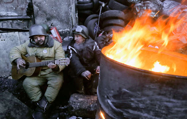 Soldiers console themselves during protests
