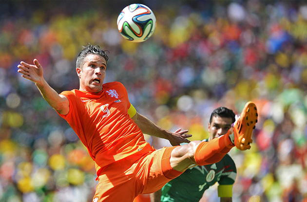 Dutch national team player Robin van Persie (L) in action with Mexican national team player Rafael Marquez (R) during the FIFA World Cup 2014 round of 16 match between the Netherlands and Mexico at the Estadio Castelao in Fortaleza, Brazil, 29 June 2014. EPA/KOEN VAN WEEL EDITORIAL USE ONLY