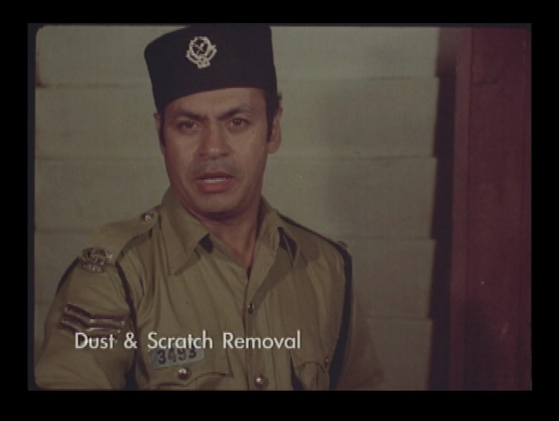 Imej dari filem Bukit Kepong sebelum proses dust & scratch removal