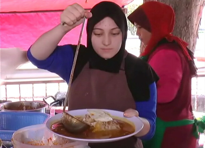 Cuaca panas tidak halang Chantal pakai tudung