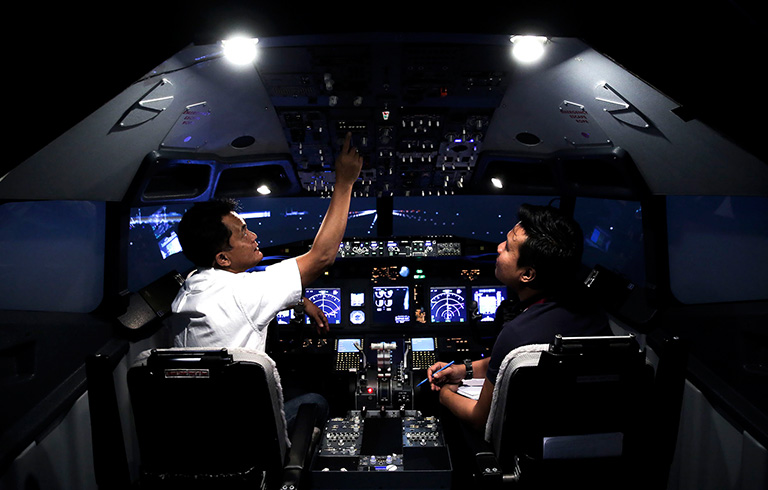 Captain Nik HUzlan and Astro AWANI reporter