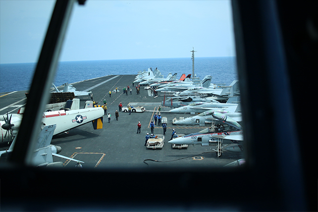 Astro AWANI's Zan Azlee witnessed fighter jets zooming over his head and heard loud machine gun fire in the South China Sea.