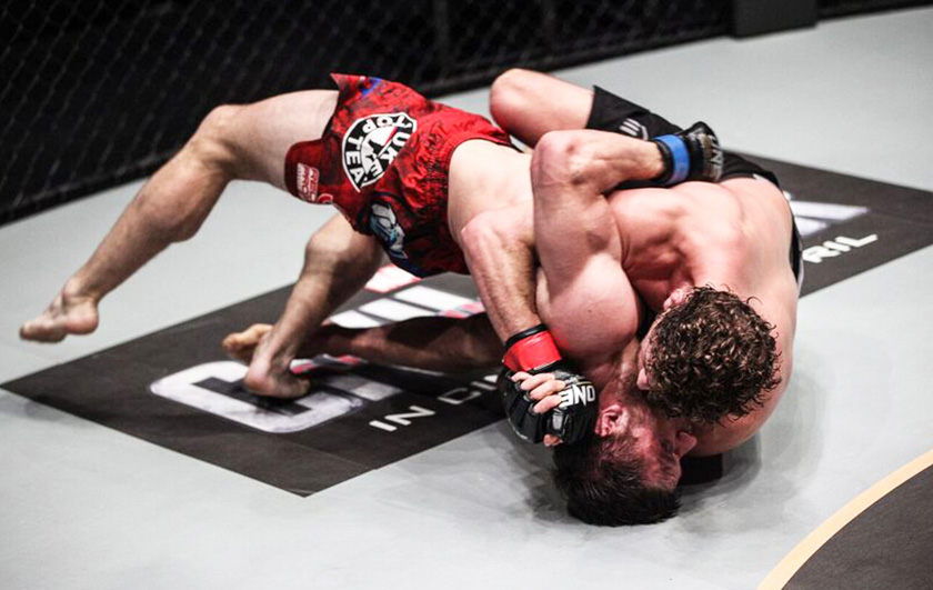 Askren (black shorts) attempting to dominate his Russian opponent on the ground. - ONE photo