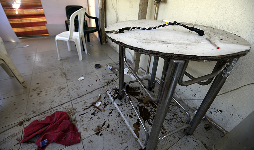 This April 14, 2015 picture shows a whip on the table in a guard's room at the three-story Chez Maurice Hotel, which was used by sex traffickers as a brothel. - AFP