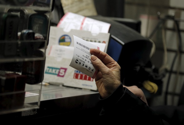 A customer purchases a Powerball lottery ticket