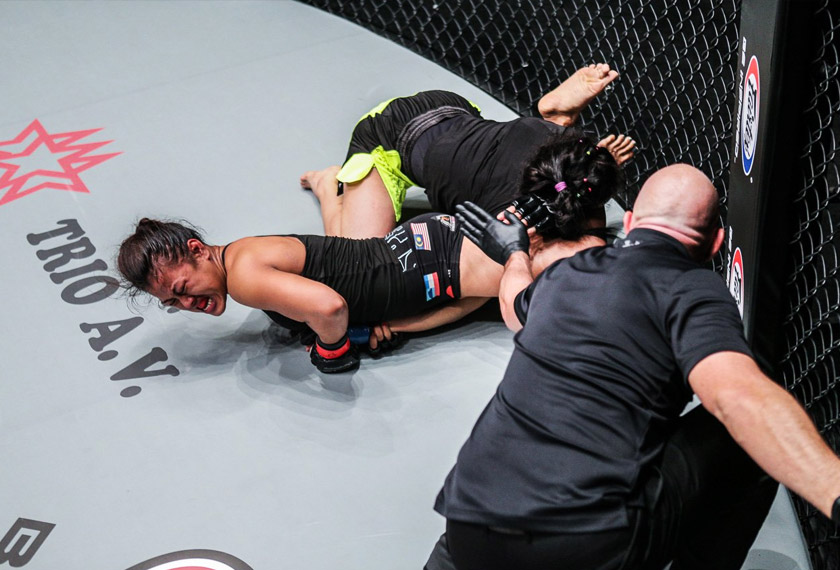 Ann Osman (left) performing an armbar submission on her opponent, Haiat Farag during ONE Championship 'Dynasty Of Champions', Saturday night. - ONE photo