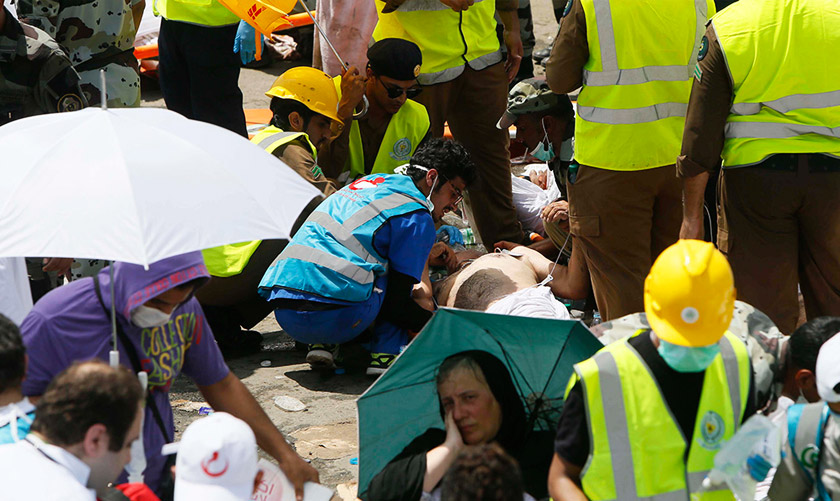 A Sept 24, 2015 file photo of rescue workers attend to victims of a stampede in Mina, Saudi Arabia during the annual hajj pilgrimage. The even was deemed as the worst disaster to ever strike the ritual. - AP Photo