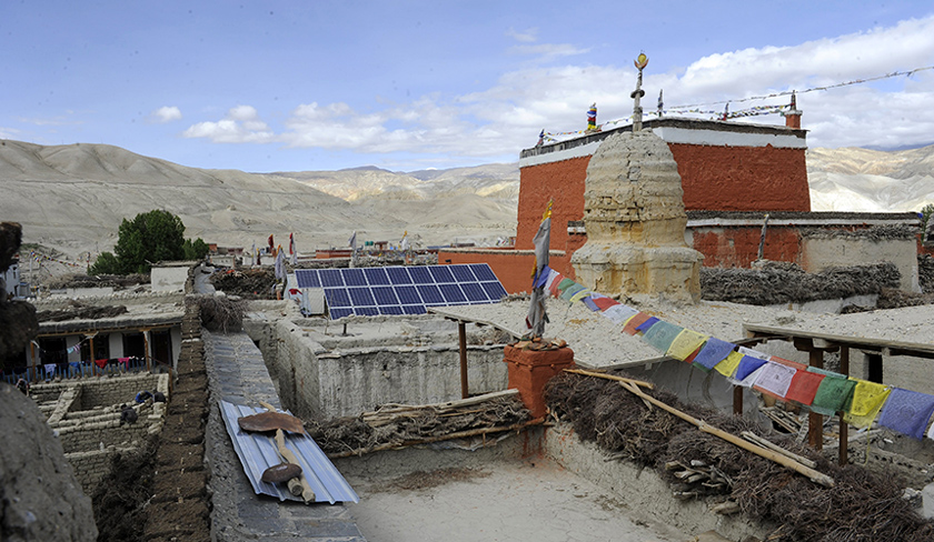 This June 17, 2016 photo shows solar panels on the rooftop of a house in the walled capital of Lo Manthang in Upper Mustang. - AFP Photo/Prakash Mathema