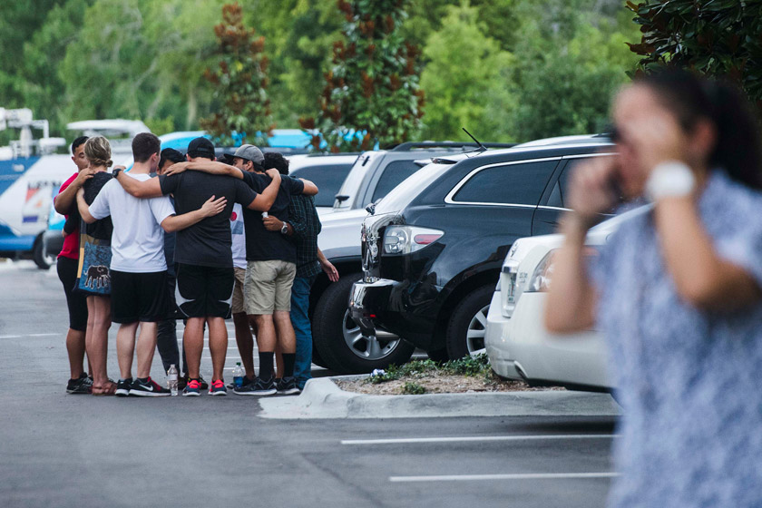 Friends and family react after being notified if their loved ones were admitted as wounded to the Orlando Regional Medical Center on Sunday A list was posted at the nearby Hampton Inn & Suites.  Amanda Voisard/The Washington Post.