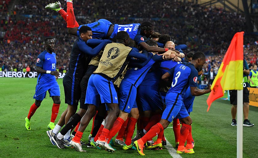 France teammates celebrate their 2-0 win over Albania in the Euro 2016 group A football match between France and Albania at the Velodrome stadium in Marseille on June 15, 2016. - AFP Photo