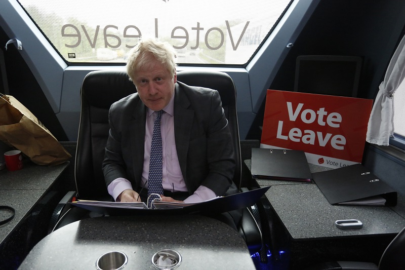 Boris Johnson, the former mayor of London, sits on board the Vote Leave Bus during the first day of a nationwide bus tour to campaign for a so-called Brexit near Exeter, U.K., on Wednesday, May 11, 2016. Johnson and his allies have accused Prime Minister David Cameron of misleading the public with scary stories about the devastating effect Brexit would have on the country's economy. Bloomberg photo by Luke MacGregor.
