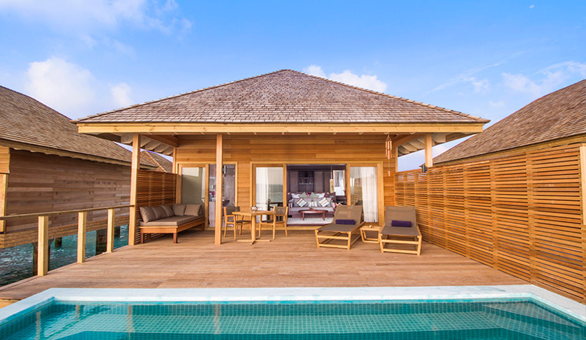 The Hurawalhi Island Resort features 90 villas that come with modern conveniences like king-size beds, air conditioning, internet access, private porches and flat screen TVs.