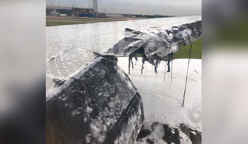 This image provided by Lee Bee Yee shows the aftermath of an engine fire on a Singapore Airlines flight, at Changi International Airport on Monday, June 27, 2016. (Lee Bee Yee via AP)