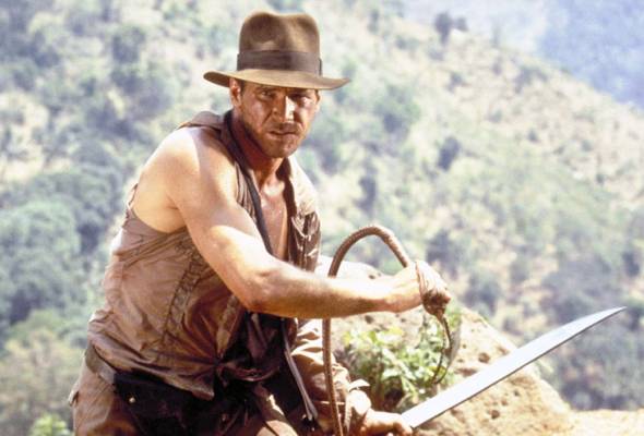 Harrison Ford muncul kali pertama sebagai Indiana Jones dalam filem Raiders of the Lost Ark pada tahun 1981 - Foto Indiana Jones