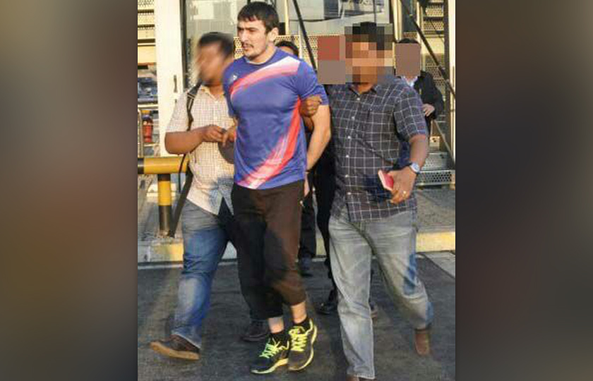 The other Russian man detained by police.