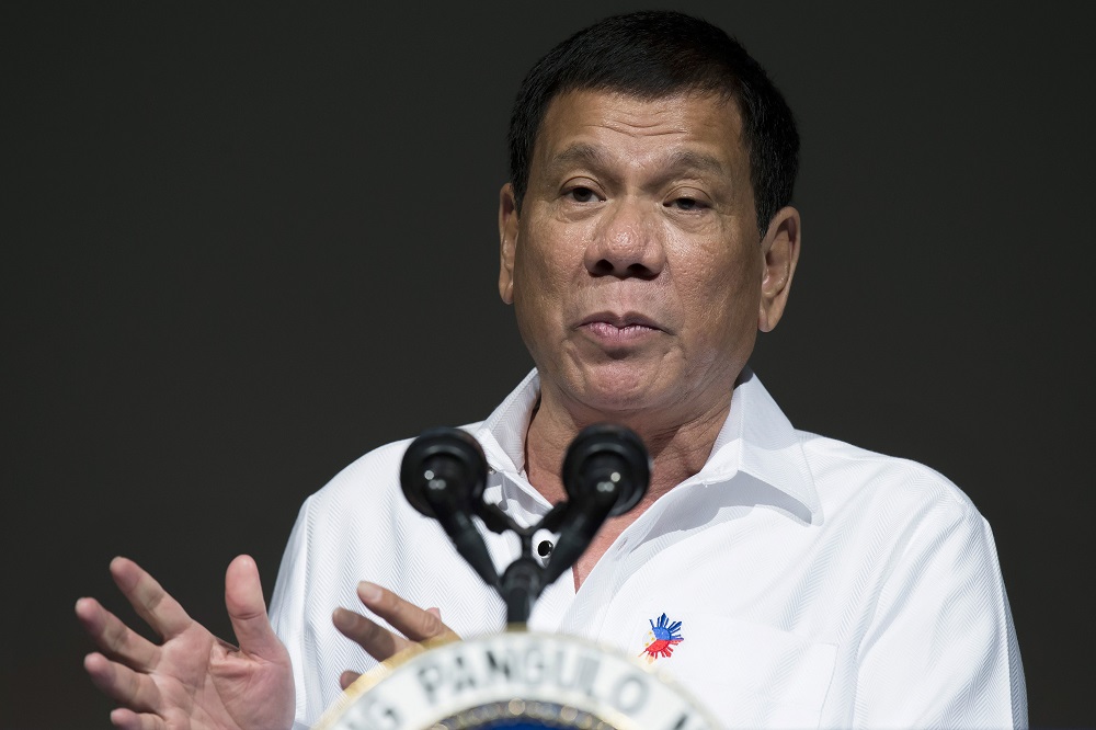 Rodrigo Duterte, the Philippines' president, speaks during the Philippine Economic Forum hosted by the Japan External Trade Organization in Tokyo on Oct. 26. CREDIT: Bloomberg photo by Tomohiro Ohsumi