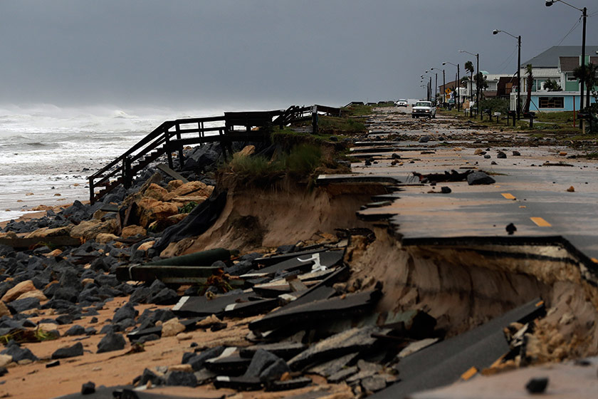 An official vehicle navigates debris as it passes along Highway A1A after it was partial washed away by Hurricane Matthew, Friday, Oct. 7, 2016, in Flagler Beach, Fla. Hurricane Matthew spared Florida’s most heavily populated stretch from a catastrophic blow Friday but threatened some of the South’s most historic and picturesque cities with ruinous flooding and wind damage as it pushed its way up the coastline. - AP Photo/Eric Gay