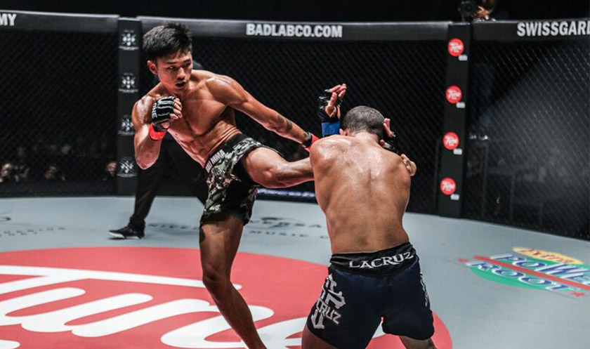 Gianni Subba (left) lands a roundhouse kick to opponent Bryan Yago of Brazil. - ONE photo