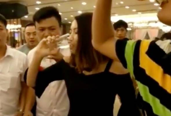 The woman consumed a drink known as Baijiu which contained 40 to 60 percent alcohol. -Photo: YouTube/ffeen