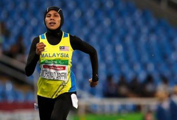 In the heats at the Rio Olympic Stadium on Monday, Siti Noor Iasah won the second heat in a time of 58.96s, a new Asian Record. - REUTERS