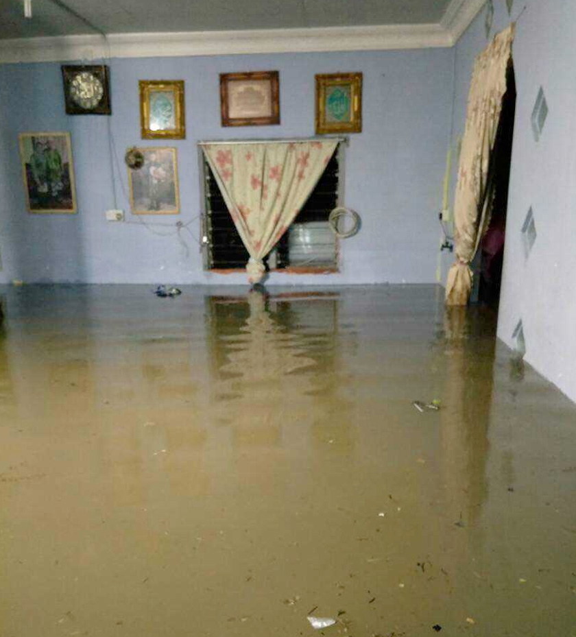 Antara kawasan yang terjejas banjir ialah di Kampung Bunga Tengilan, Tuaran. - Astro AWANI