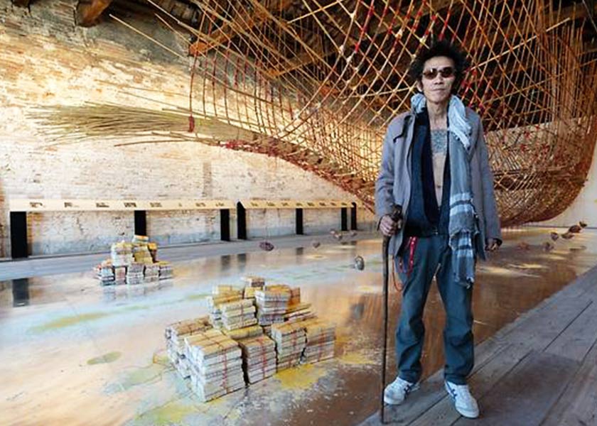 Singaporean artist Zai Kuning with his installation Dapunta Hyang: Transmission of Knowledge at the Singapore Pavilion. Singapore National Arts Council / Channel News Asia