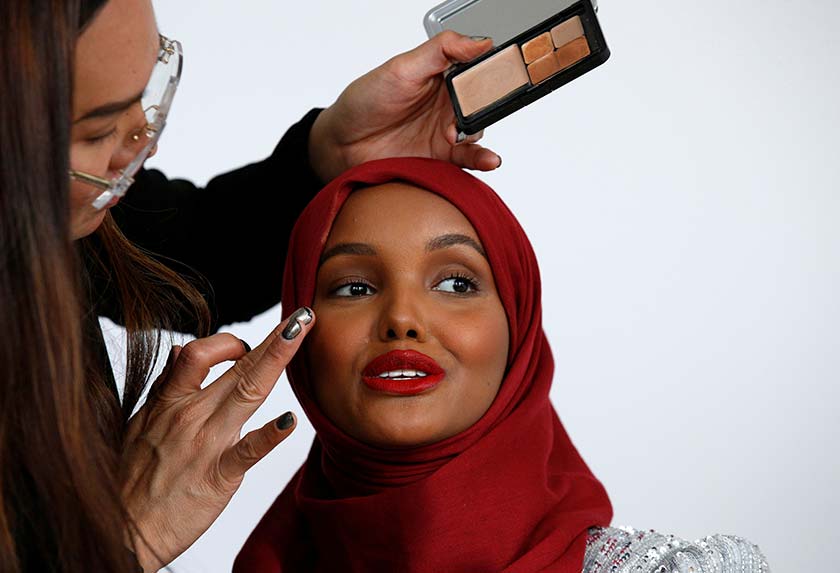 Halima has her makeup applied during a shoot at a studio in New York City on Aug 28, 2017. - REUTERS