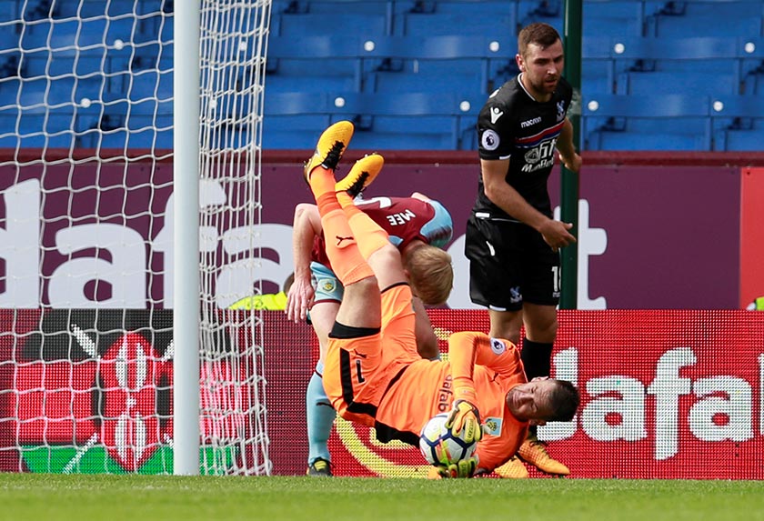 Heaton gathers the ball before sustaining an injury during the Burnley vs Crystal Palace match on Sept 10, 2017. - REUTERS