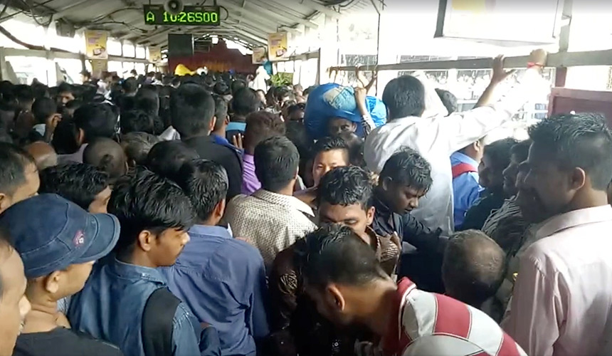Crowds of commuters are seen moving along the Elphinstone railway station bridge around the time of a stampede, in Mumbai on Sept 29, 2017, in this still image taken from social media video. - REUTERS