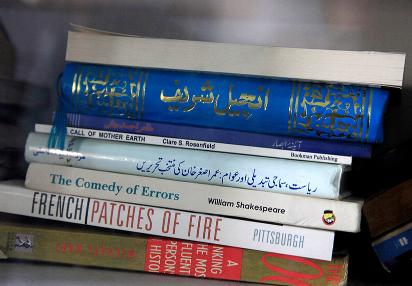 Antara bahan bacaan Malala yang masih tersimpan kemas dalam sebuah almari di kediamannya. - Reuters