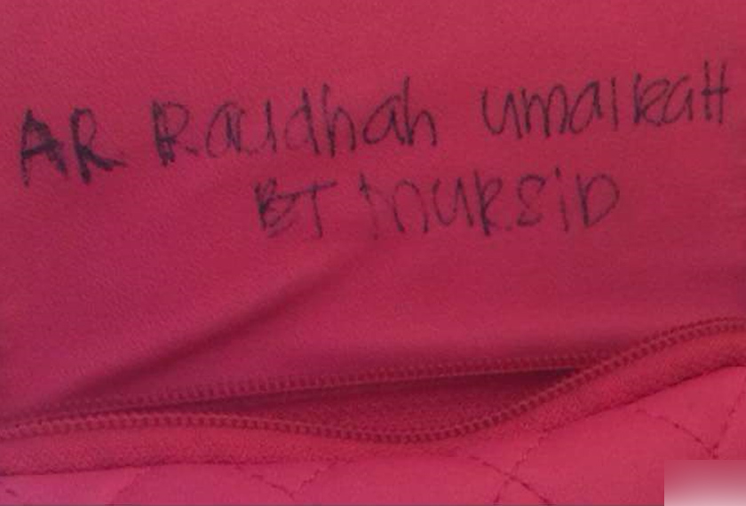 Nama pemilik beg yang tertulis pada beg tersebut