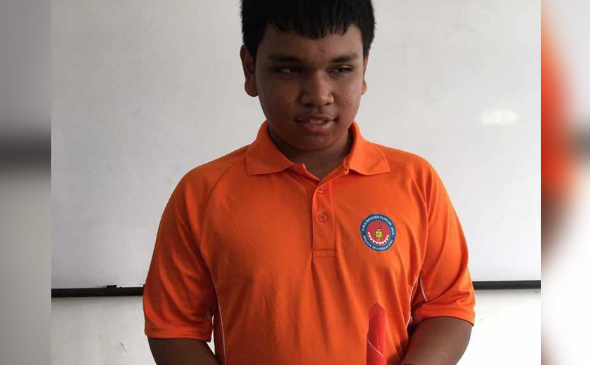 Kali terakhir Muhammad Ridzuan memakai baju-T berwarna jingga dan berseluar sukan panjang berwarna gelap. - Foto Ihsan Keluarga 