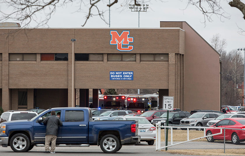 Kru kecemasan mengawal keadaan di Marshall County High School pada 23 Jan 2018. - AP