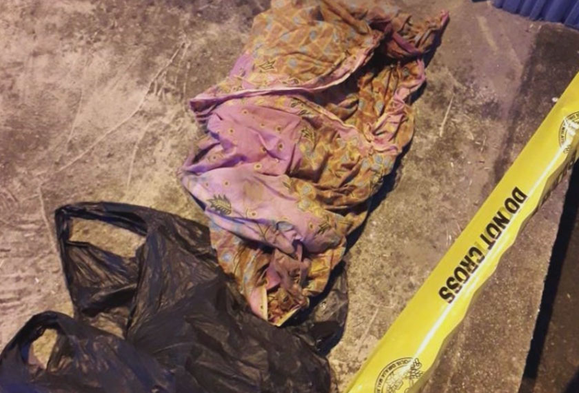 Mayat bayi yang ditinggalkan di pekarangan Masjid Pulau Ketam, Tunjang dekat Jitra, awal pagi ini.