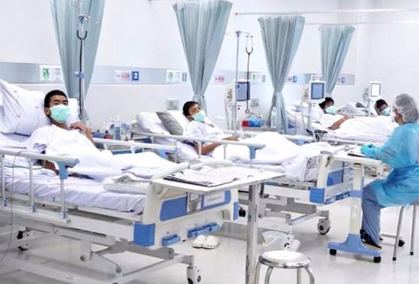 A screen grab shows boys rescued from the Thai cave wearing mask and resting in a hospital in Chiang Rai, Thailand from a July 11, 2018 handout video. Govt PRD and Govt Spokesman Bureau/Handout via REUTERS TV