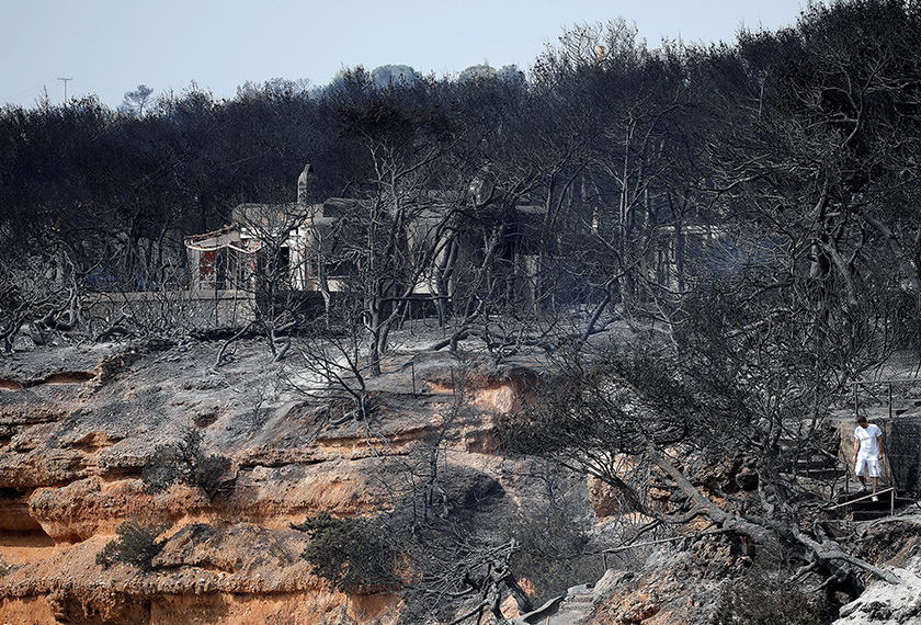 Pemandangan di cerun yang terbakar susulan kebakaran hutan di bandar Mati, dekat Athens, Greece, 24 Julai, 2018. REUTERS