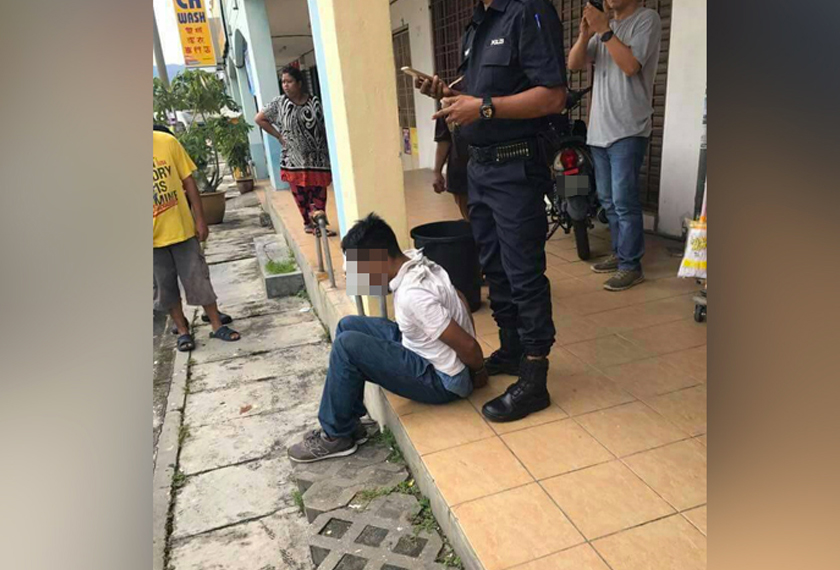 Suspek yang diberkas orang ramai. - Astro AWANI