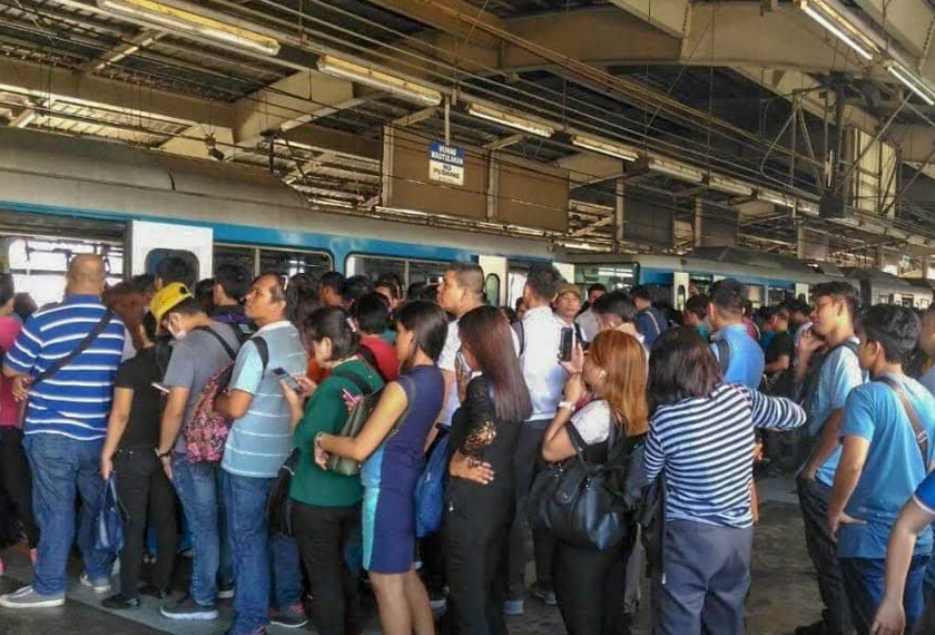 Commuters queue for an average of two to three hours to get on the MRT trains in the Greater Manila Area, with its population of 21.3 million. Lhorenz Martinez/Ceritalah