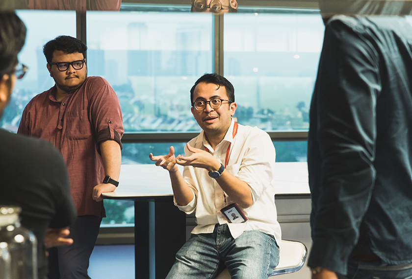 Head of Digital and New Media Ezra Zaid sits in the pantry with his team, passionately brainstorming ideas for potential projects. Pix by Joe Kit Yong