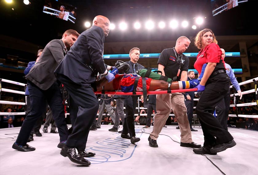 Day dibawa ke haspital selepas tumpas pada pusingan ke-10 bertarung dengan Charles Conwell. - Foto Agensi