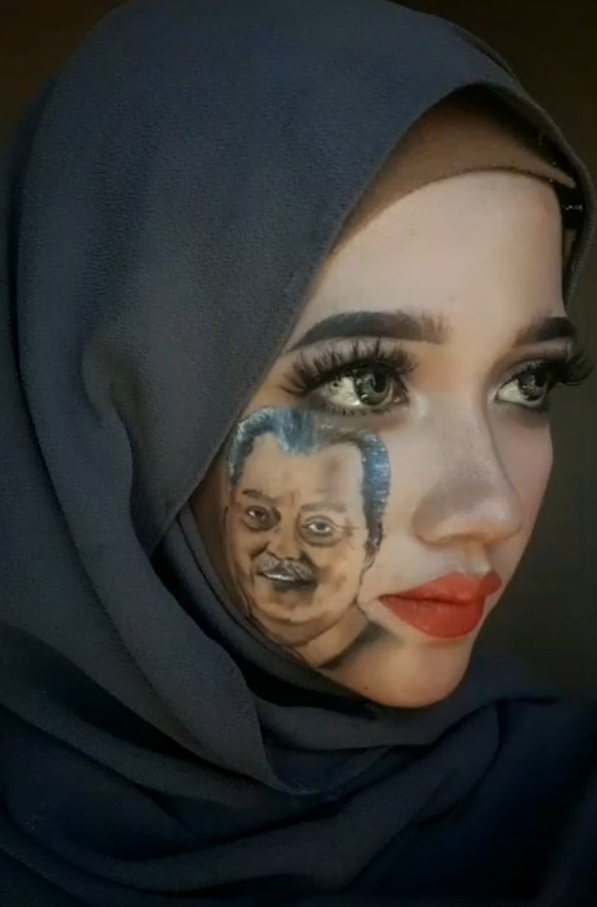 Odiliawati melakar wajah Perdana Menteri, Tan Sri Muhyiddin Yassin pada wajahnya sendiri. 