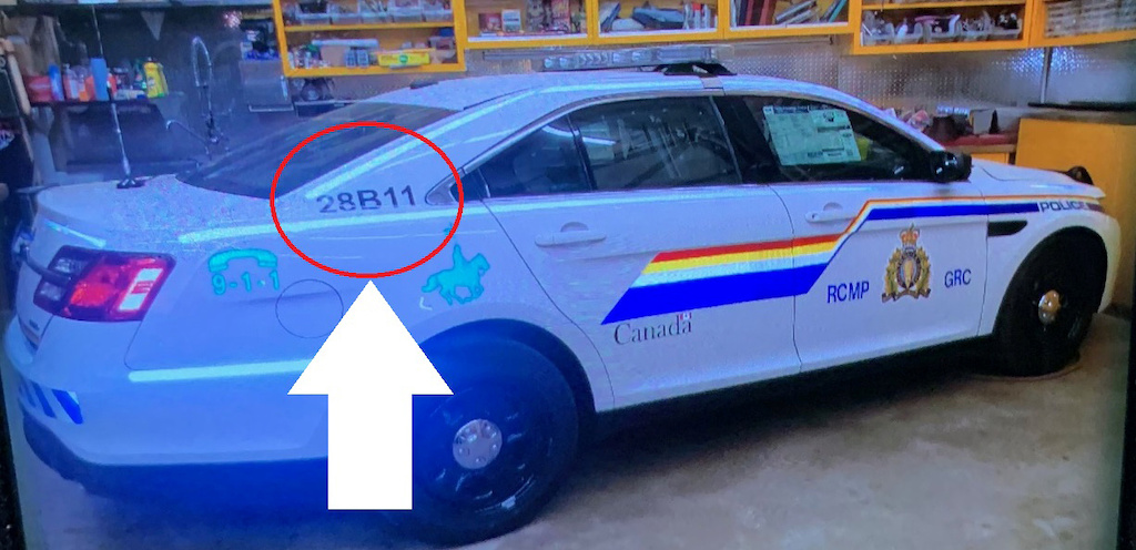 An undated photograph of a Royal Canadian Mounted Police (RCMP) cruiser, altered by the RCMP to point out the car's unique number, is shown in an appeal to the public after they say multiple victim shooting suspect Gabriel Wortman could be driving the car and wearing an RCMP uniform near Portapique, Nova Scotia, Canada April 19, 2020. RCMP Nova Scotia/Handout via REUTERS.