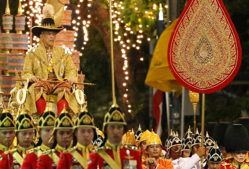 Thailand's newly crowned King Maha Vajiralongkorn and Queen Suthida are seen during the coronation procession, in Bangkok, Thailand May 5, 2019. REUTERS