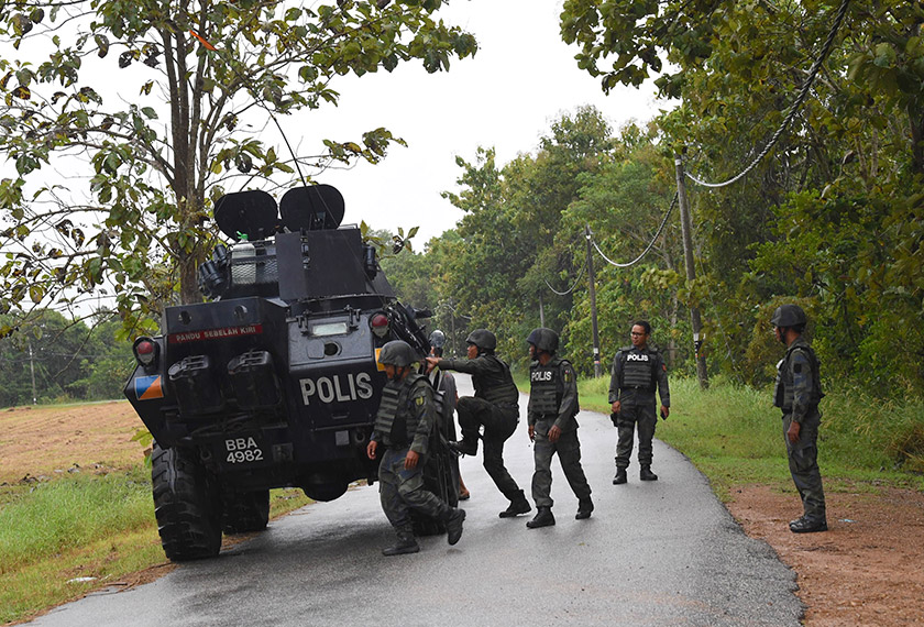 Member of PGA Battalion 3, Company B, during a patrol with Commando V-150 at the Malaysia-Thailand border