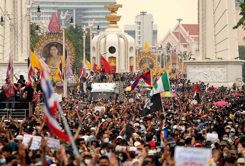 Pro-democracy demonstrators march during a Thai anti-government mass protest, on the 47th anniversary of the 1973 student uprising, in Bangkok, Thailand October 14, 2020. - REUTERS