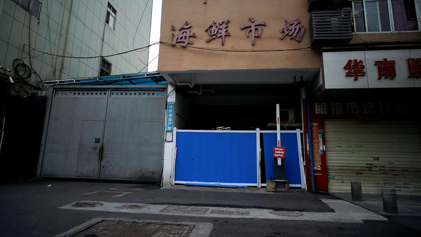 A blocked entrance to Huanan seafood market, where the coronavirus that can cause COVID-19 is believed to have first surfaced, is seen in Wuhan, Hubei province, China March 30, 2020. Picture taken March 30, 2020. REUTERS/Aly Song/File Photo