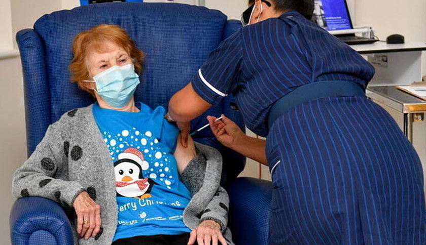 Margaret Keenan was given the vaccine by May Parsons, a matron at University Hospital in Coventry. - REUTERS